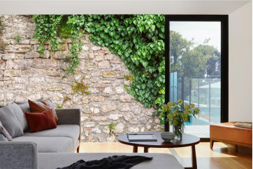 Fototapet - Stone Wall With Leaves- interiørbillede