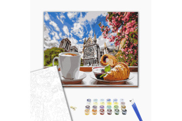 Mal efter tal - Coffee with croissant on the background of the cathedral